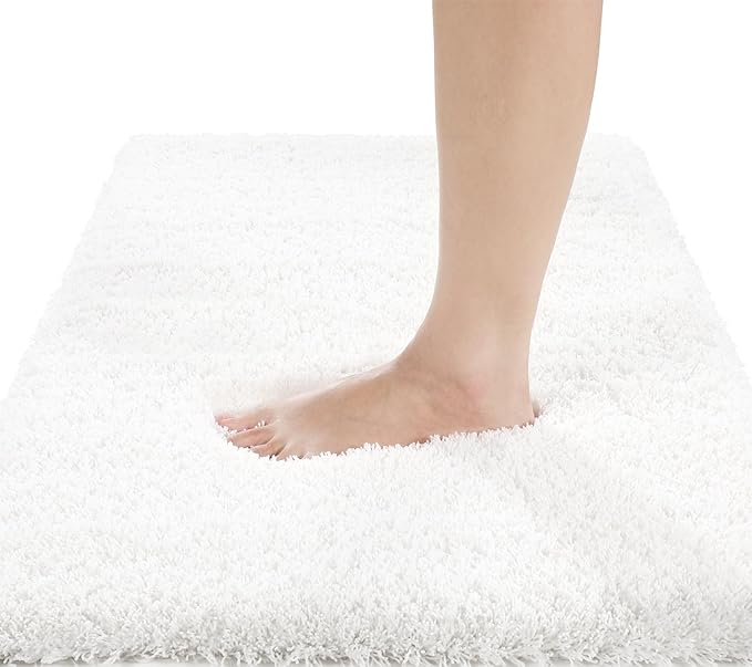 Yimobra Fluffy Plush Bath Rug, Super Shaggy Soft Comfortable Non Slip, Water Absorbent Microfiber Bath Mat, Dries Quickly, Machine Washable Thick Bathroom Rugs for Shower, 56"x 24", Off White