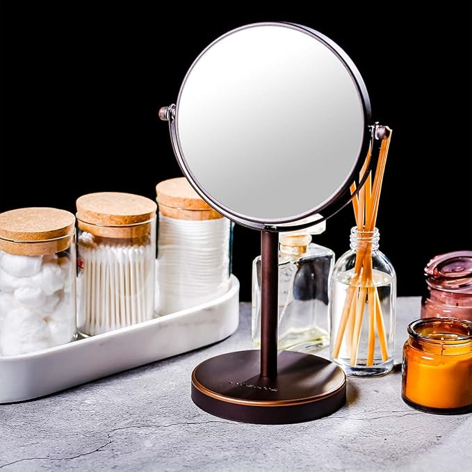 OVENTE 6'' Tabletop Makeup Mirror with 1X/7X Magnification, 360° Swivel Design, Double-Sided Free-Standing Vanity Mirror Perfect for Dresser, Bedroom and Office Desk, Antique Bronze MNLT60ABZ1X7X