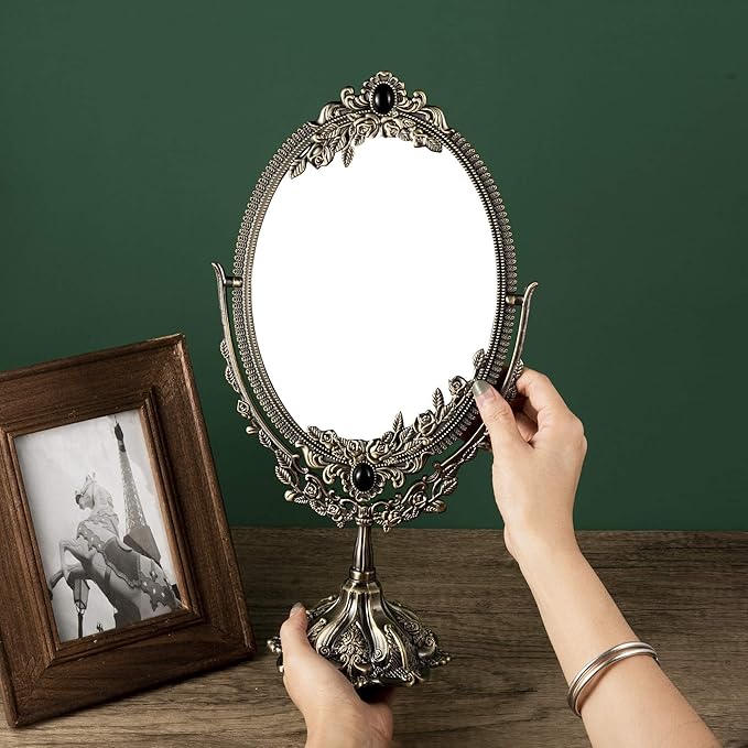 Feyarl 15 inch Vintage Makeup Mirror Floral Tabletop Oval Vanity Mirror with Stand Dressing Room Swivel Double Sided Elegant Decorative Mirror Embossed Frame